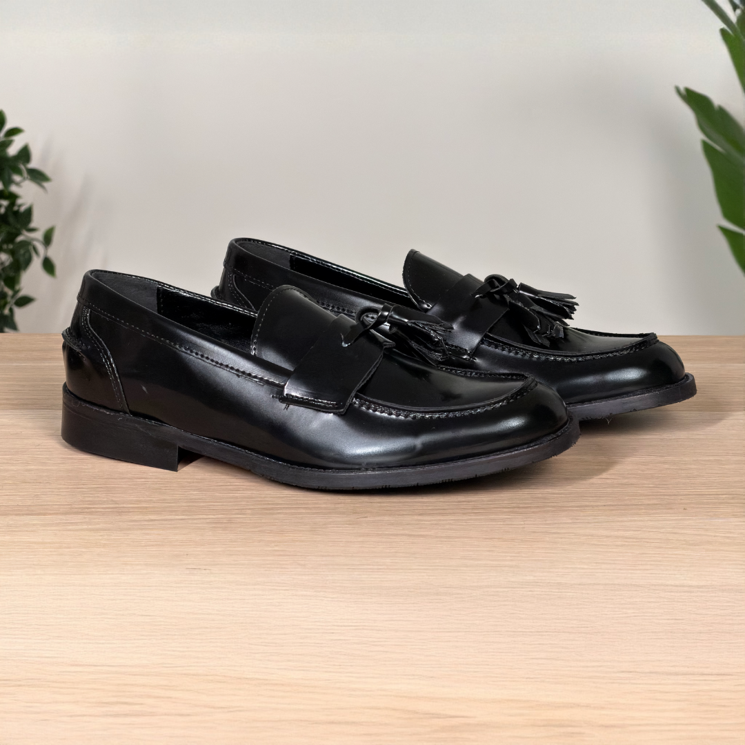 Mocassino classico in pelle lucida con nappine - Nero