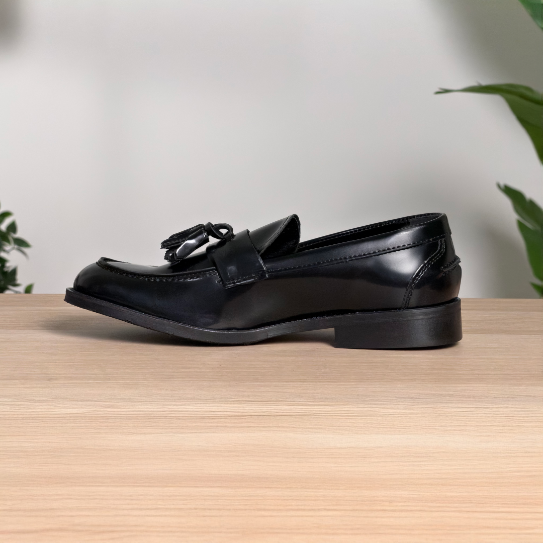 Mocassino classico in pelle lucida con nappine - Nero